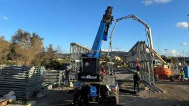 Photo documentation of construction work on temporary bridge at Rotonda.